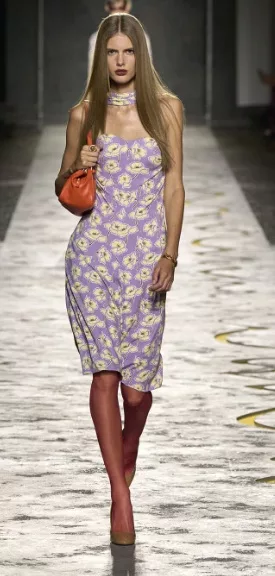 Versace SS25 look in Aperol orange