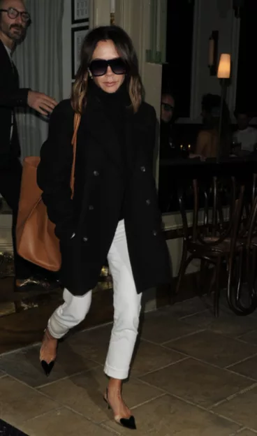 Victoria Beckham wearing pointed-toe micro kitten heels