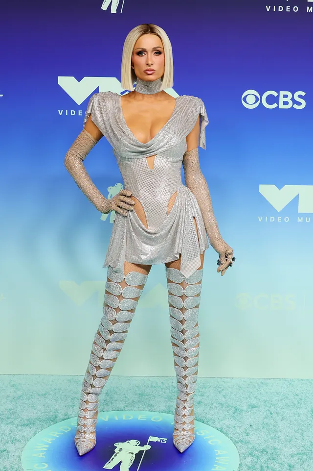 Paris Hilton in a crystal-embellished silver The Blonds dress at the 2026 MTV VMAs