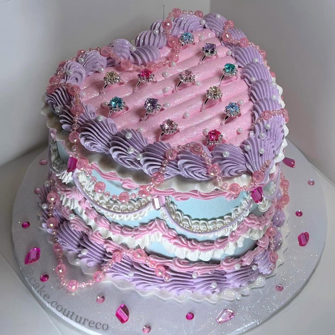 Pastel jewellery box cake decorated with jewel rings, pearls and beaded piping