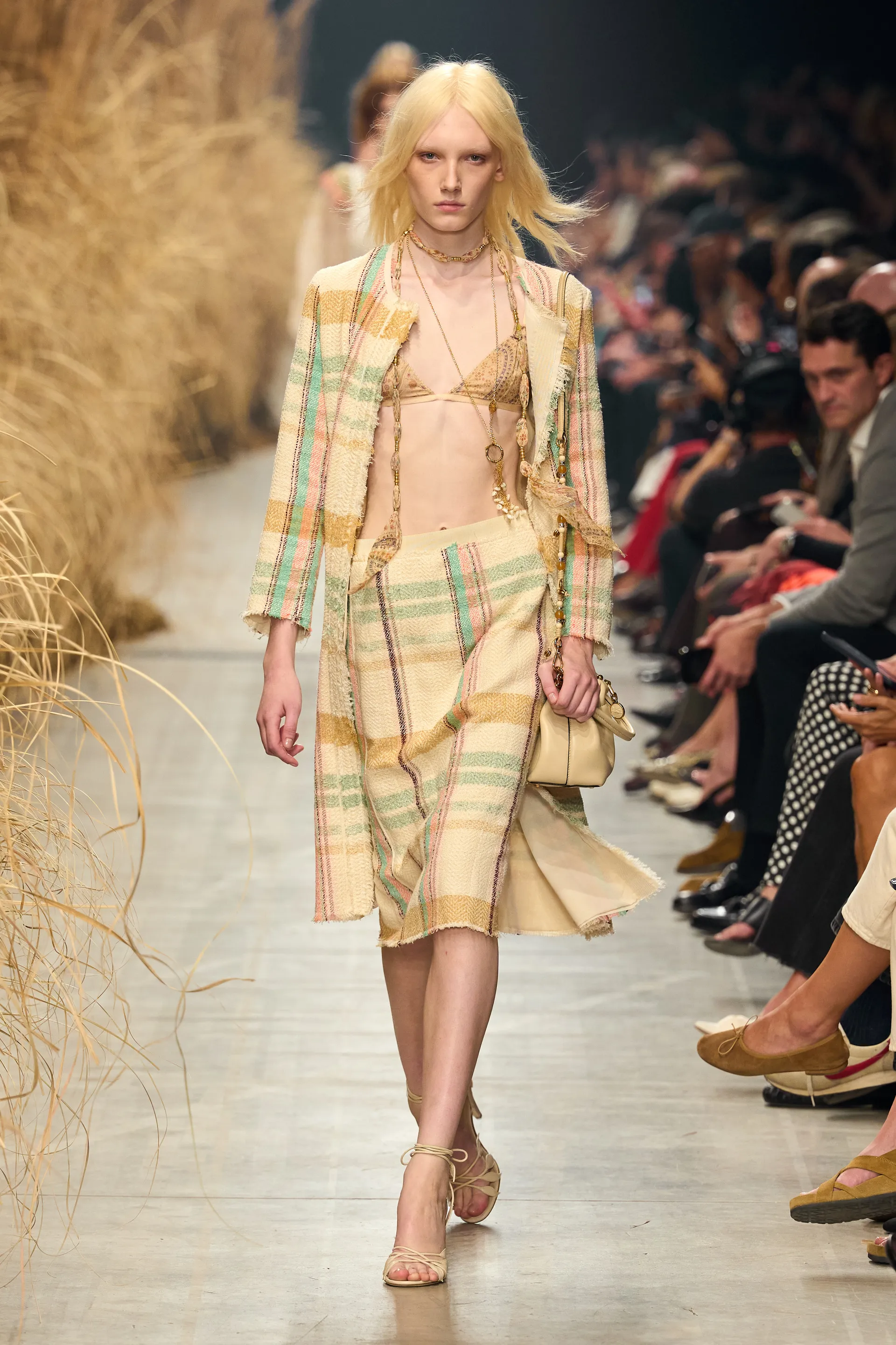 Etro Spring 2027 lace bralette worn beneath an open jacket with a coordinating skirt