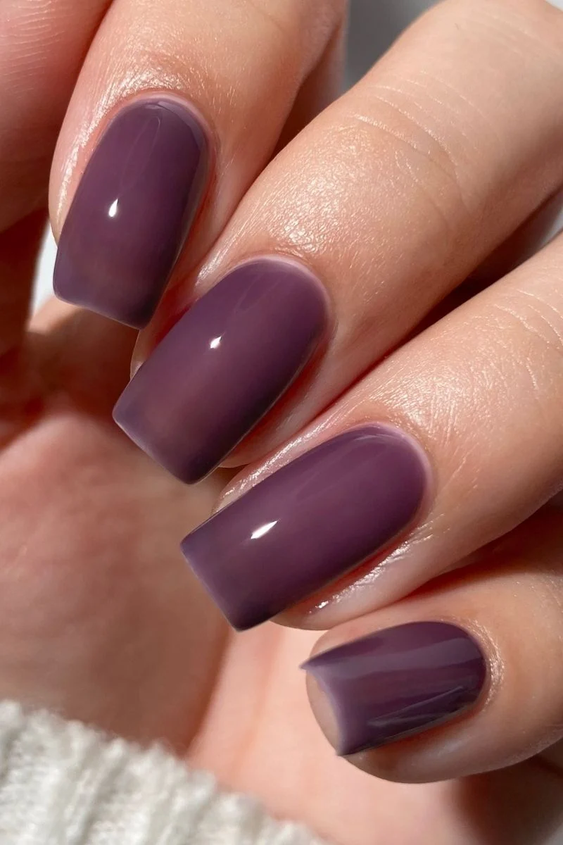 Purple blackberry jammy nails with a glossy translucent jelly finish