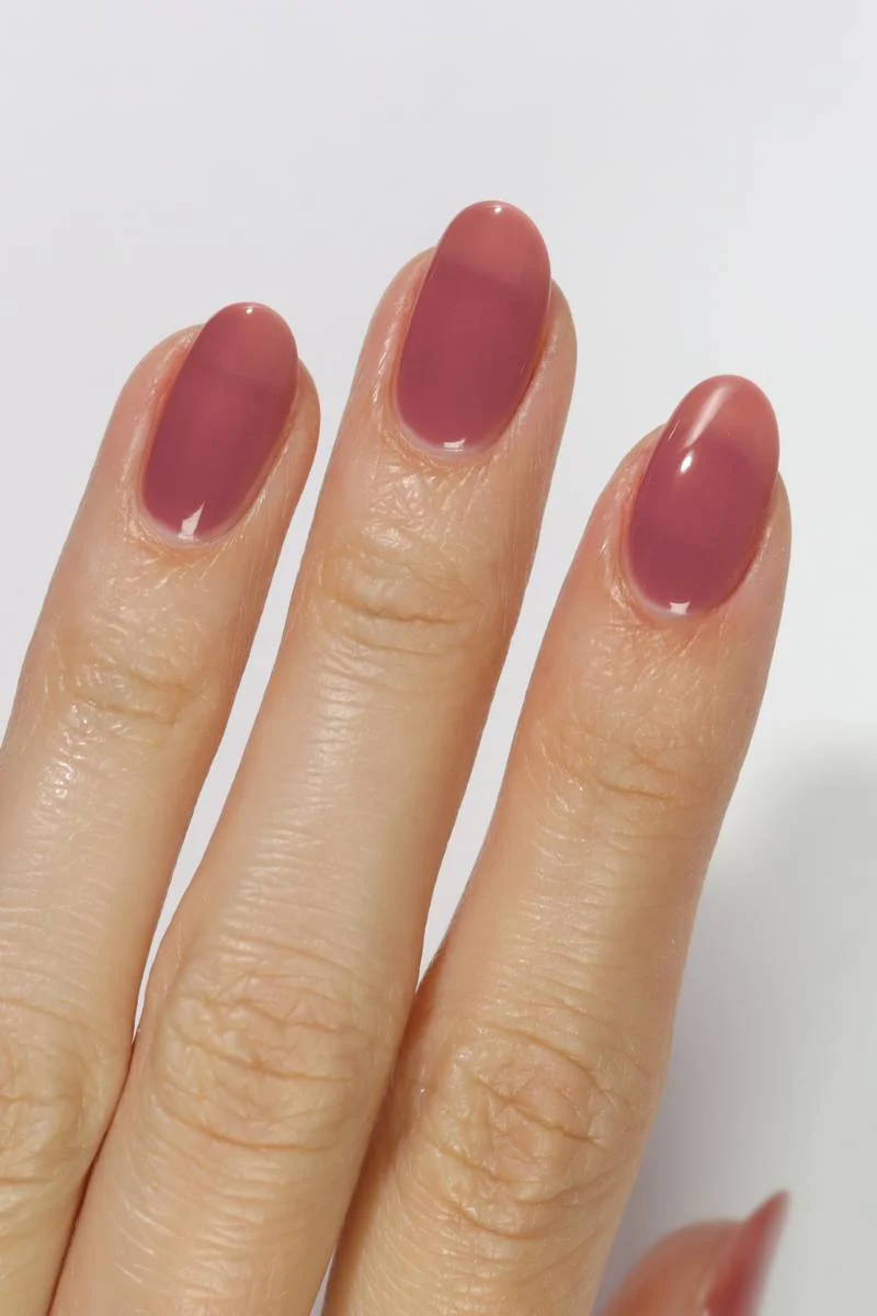 Pink raspberry jelly nails with a sheer glossy finish