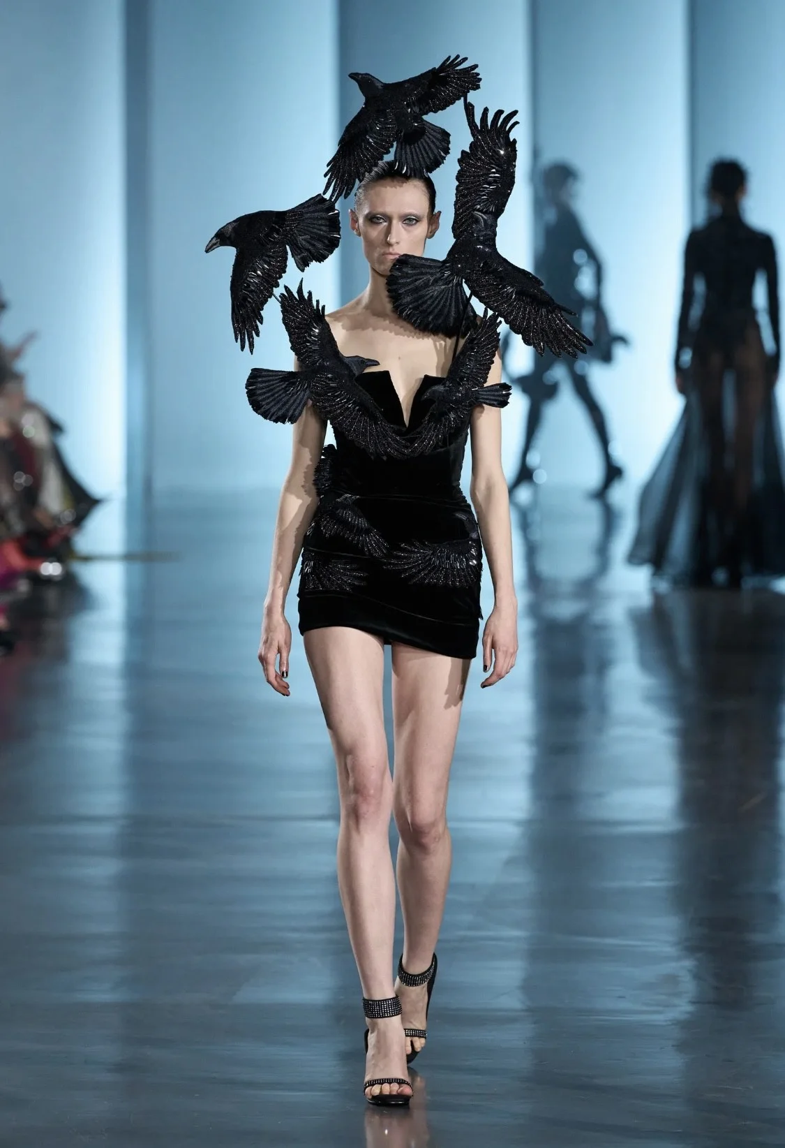 Top designers shaping Spring 2025 fashion trends with bold patterns.