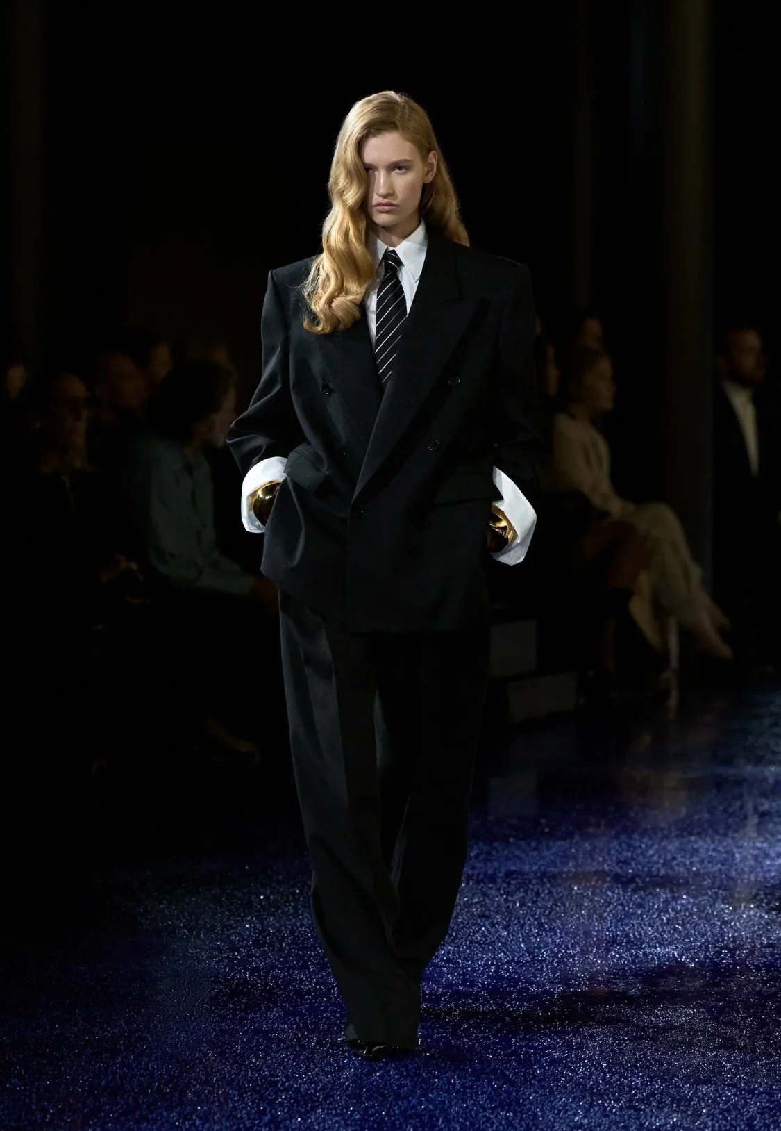 Models showcasing Spring 2025 fashion trends on the runway.
