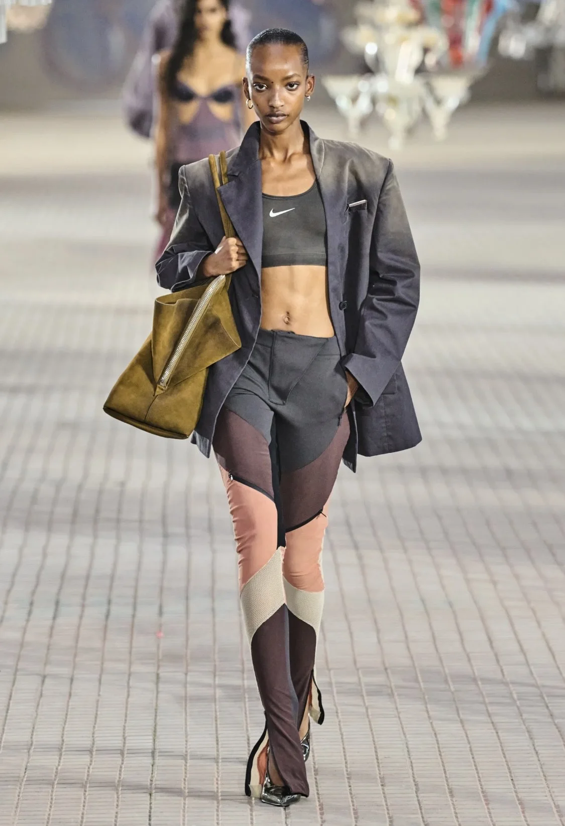 Models showcasing Spring 2025 fashion trends on the runway.